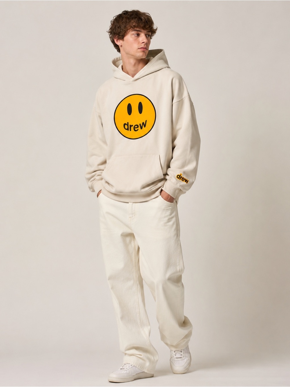 Drew House Cream Hoodie with Yellow Smiley Graphic